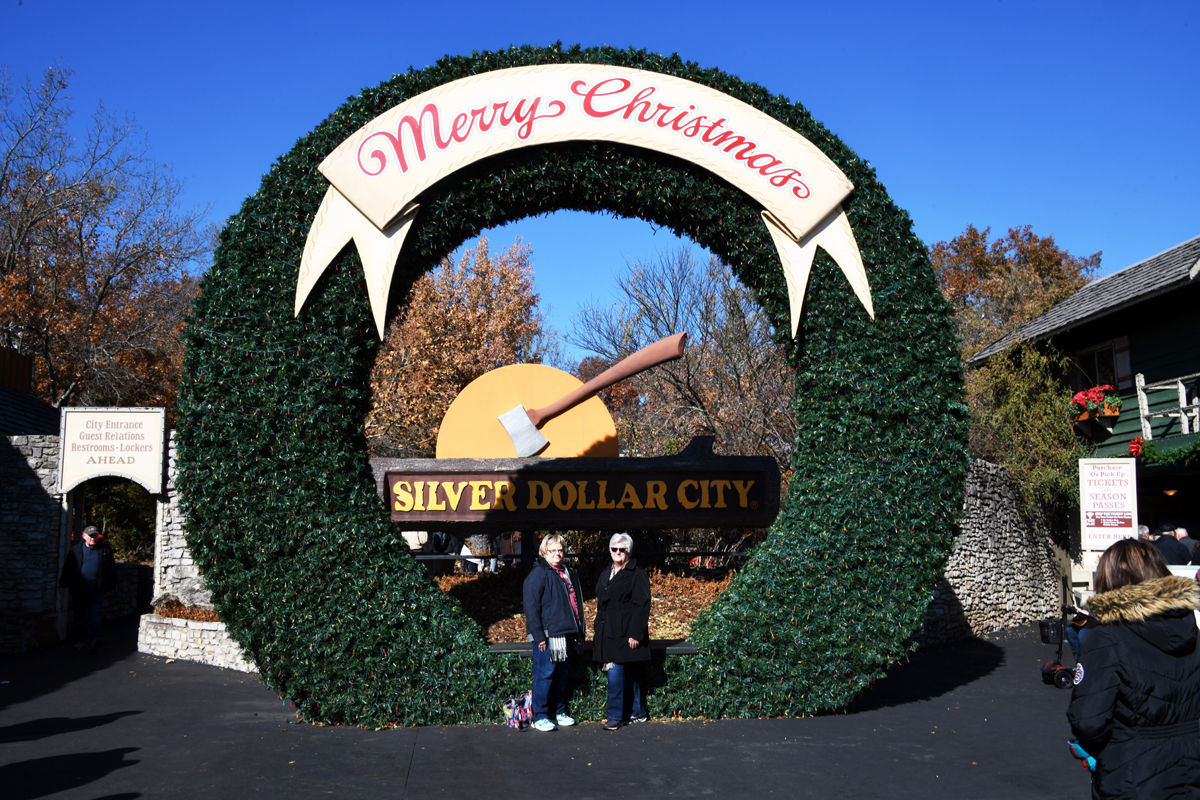 132 Deb Figgner and Jan With at the entrance to Silver Dollar City.jpg
